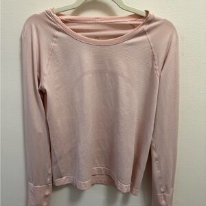 Lululemon pink shirt- sz 12. Only worn once. Excellent condition